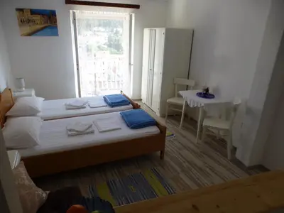 Krevet ili kreveti u jedinici u objektu Guesthouse Bracanović