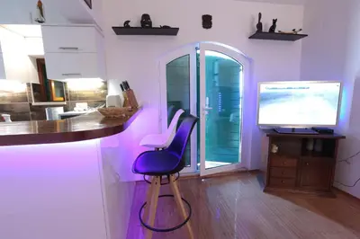 TV i/ili zabavni centar u objektu Cottage Holiday Home