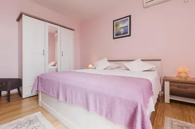 Krevet ili kreveti u jedinici u objektu Apartment Kuzmanić