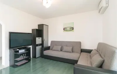 TV i/ili zabavni centar u objektu Holiday Home Gata 15