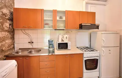 Kuhinja ili čajna kuhinja u objektu Holiday Home Kucice 34