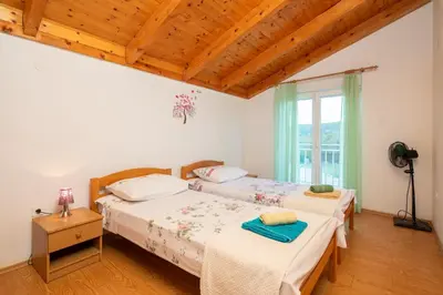 Krevet ili kreveti u jedinici u objektu Poolside Paradise
