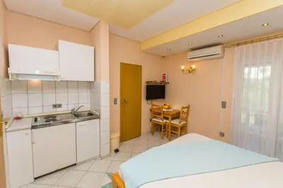 Kuhinja ili čajna kuhinja u objektu Apartments Tonko