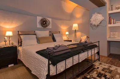 Krevet ili kreveti u jedinici u objektu Heraclea Residential Apartments