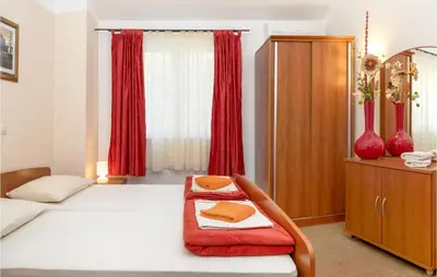Krevet ili kreveti u jedinici u objektu Lovely Apartment In Baska Voda With Swimming Pool