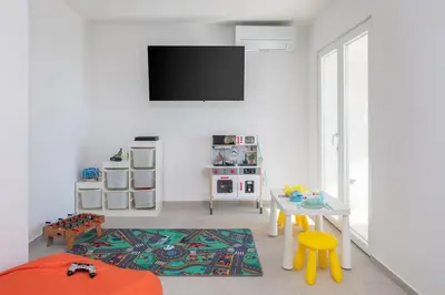 TV i/ili zabavni centar u objektu Modern Villa Maris - with heated pool & sea view
