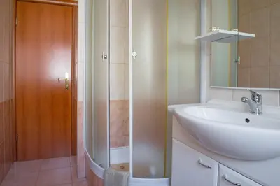 Kupaonica u objektu Apartmani Saric