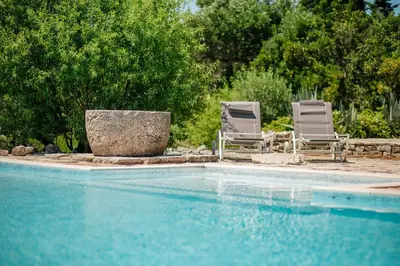 Bazen u objektu Outstanding Hvar Villa 4 Bedrooms Villa Dvori Pogled Tennis Court ili u blizini