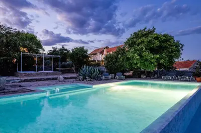Bazen u objektu Outstanding Hvar Villa 4 Bedrooms Villa Dvori Pogled Tennis Court ili u blizini