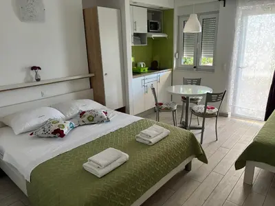 Krevet ili kreveti u jedinici u objektu Apartmani Adria 2