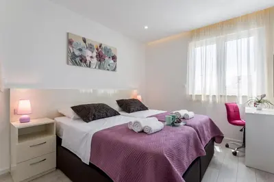 Krevet ili kreveti u jedinici u objektu Apartments by the sea Podstrana, Split - 11935