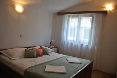 Krevet ili kreveti u jedinici u objektu Apartmani Dalmadino