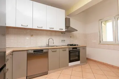 Kuhinja ili čajna kuhinja u objektu Apartment Duce beach