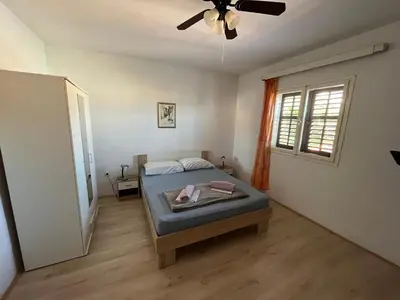Krevet ili kreveti u jedinici u objektu Apartments by the sea Jelsa, Hvar - 22256
