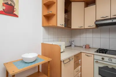 Kuhinja ili čajna kuhinja u objektu West Side Apartment