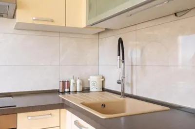 Kuhinja ili čajna kuhinja u objektu Coastal Comfort Apartment