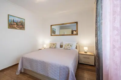 Krevet ili kreveti u jedinici u objektu Jasmir Apartment - Free parking near the beach