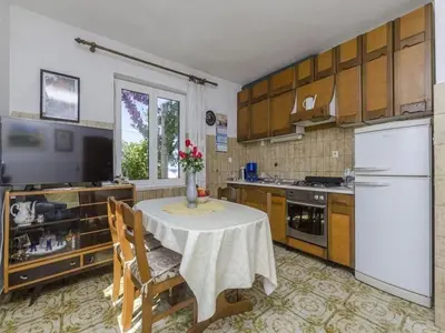 Kuhinja ili čajna kuhinja u objektu Apartments by the sea Postira, Brac - 22356