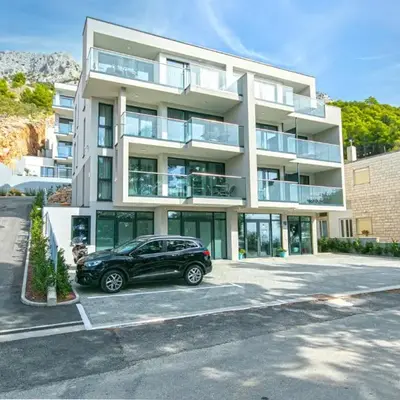 Seaside apartments with a swimming pool Brela