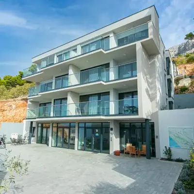 Seaside apartments with a swimming pool Brela