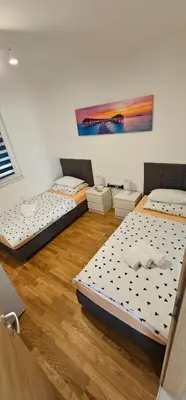 Krevet ili kreveti u jedinici u objektu Split/Podstrana Apartment ADRIA