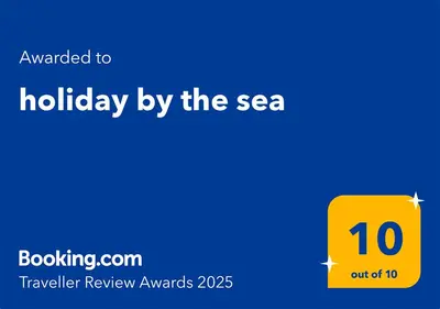 Certifikat, nagrada, logo ili neki drugi dokument izložen u objektu holiday by the sea
