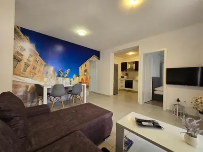 TV i/ili zabavni centar u objektu Holiday apartments Stobrec 2