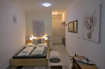 Krevet ili kreveti u jedinici u objektu Slava Apartment