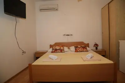 Krevet ili kreveti u jedinici u objektu Apartments by the sea Milna, Hvar - 22619