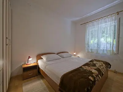 Krevet ili kreveti u jedinici u objektu Apartments by the sea Postira, Brac - 22200