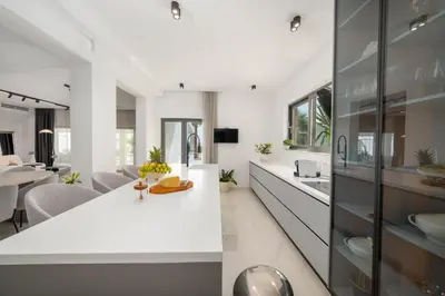TV i/ili zabavni centar u objektu Luxury beachfront Villa Providenca