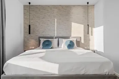 Krevet ili kreveti u jedinici u objektu Villa Grey with 4 bedrooms, Heated pool, Sauna, Media room, Sea Views