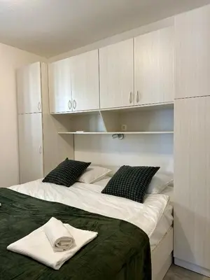 Krevet ili kreveti u jedinici u objektu Apartament Sunny Mimice z widokiem na morze