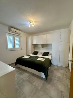 Krevet ili kreveti u jedinici u objektu Apartament Sunny Mimice z widokiem na morze