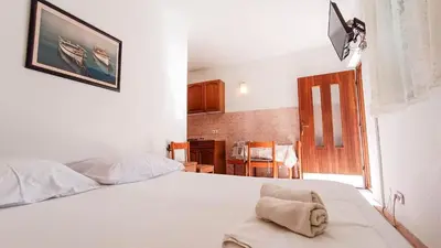 Krevet ili kreveti u jedinici u objektu Apartments Ines - 15 meters from the beach