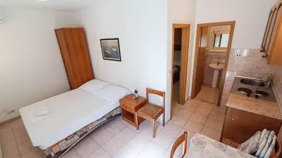 Krevet ili kreveti u jedinici u objektu Apartments Ines - 15 meters from the beach
