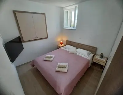 Krevet ili kreveti u jedinici u objektu Apartments by the sea Povlja, Brac - 22899
