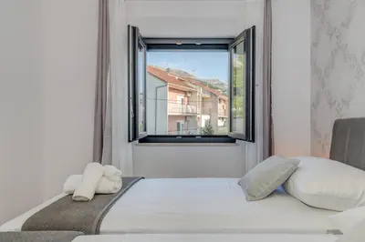 Krevet ili kreveti u jedinici u objektu [BRAND NEW] Apartment Strozanac - near the beach