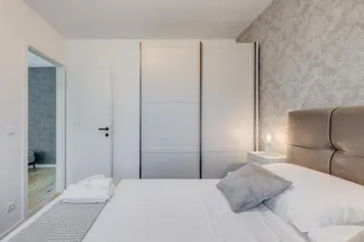 Krevet ili kreveti u jedinici u objektu [BRAND NEW] Apartment Strozanac - near the beach