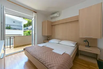 Krevet ili kreveti u jedinici u objektu Apartmani Brela 1