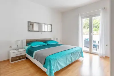 Krevet ili kreveti u jedinici u objektu Apartments Dobrila 1