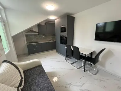 Kuhinja ili čajna kuhinja u objektu New Comfort Studio Apartment
