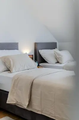 Krevet ili kreveti u jedinici u objektu Apartmani Indigo
