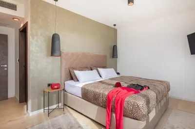 Krevet ili kreveti u jedinici u objektu Luxury Villa Cosmopolitan with Pool
