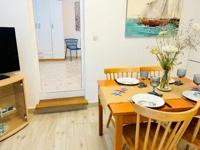 TV i/ili zabavni centar u objektu Apartment Sunny Elza 2