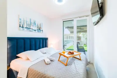 Krevet ili kreveti u jedinici u objektu Design Apartment Split