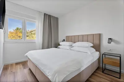 Krevet ili kreveti u jedinici u objektu Seaview Villa ELZA with heated pool, summer kitchen, gym, seaviews