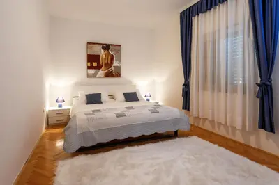 Krevet ili kreveti u jedinici u objektu Relaxing and cozy apartments with pool Sara&Nino