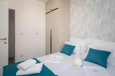 Krevet ili kreveti u jedinici u objektu TT Apartment with sea view and private parking