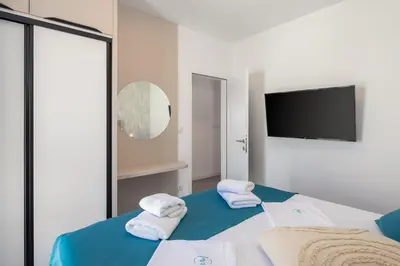 Krevet ili kreveti u jedinici u objektu TT Apartment with sea view and private parking